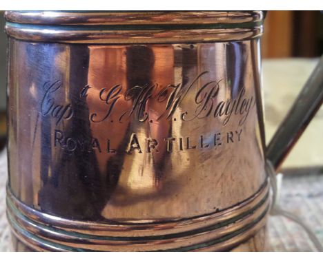 A lidded copper tankard,  height 6½” including ebony knob, the body engraved “Capt G H W Bayley, Royal Artillery”, the base s