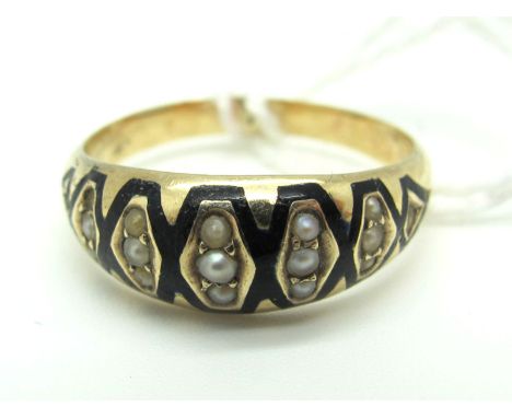 A Pearl and Enamel Mourning Ring,of graduated design, with concealed circular glazed locket panel (finger size L/M).