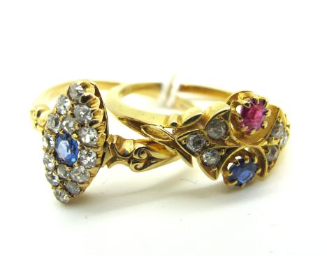 A Delicate Victorian Style Dress Ring, with claw set inset highlights, within boat shape setting, between decorative shoulder