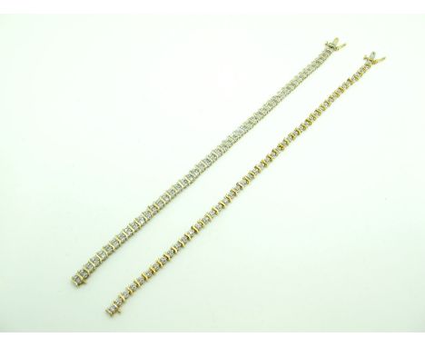 A Fancy Two Row Panel Style Bracelet, with allover claw set highlights, to snap clasp, stamped "375"; together with another s