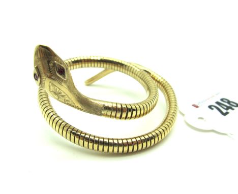 A 9ct Gold Victorian Style Serpent Bangle, with steel sprung body, engraved head and inset eyes, Birmingham 1966.