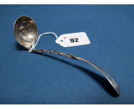 A Scottish Hallmarked Silver Sauce Ladle, CH, Edinburgh 1806, with twisted handle, initialled.