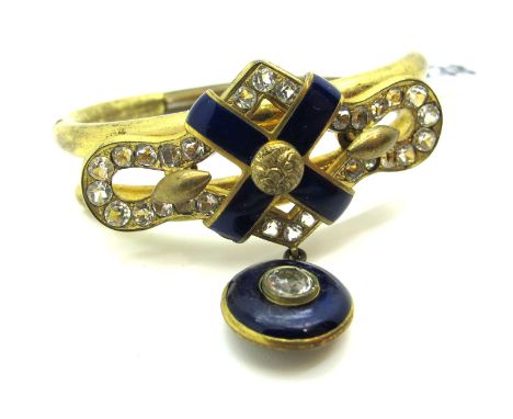 A Victorian Enamel Bangle, of openwork design, with inset highlights and blue enamel, suspending circular pendant drop, of sp