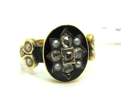 A Diamond and Pearl Set Morning Ring, the oval black enamel panel inset with rose cut diamonds, between pearl set shoulders, 
