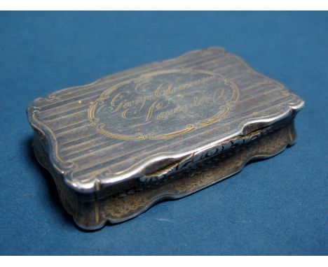 A Hallmarked Silver Snuff Box, Nathaniel Mills, Birmingham 1846, of shaped rectangular form, allover engine turned and inscri