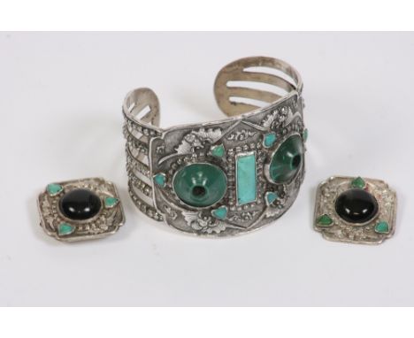 A Chinese white metal and hardstone set bangle, and a pair of similar ear clips