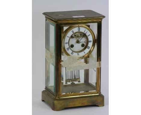 A 19th Century brass cased four glass mantel clock, the circular white enamel Roman numeral dial with visual escapement, merc