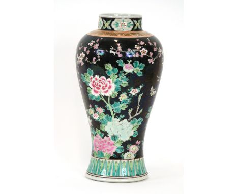 A 19th Century Chinese famille noir baluster vase, red scroll mark to base, 30cm high