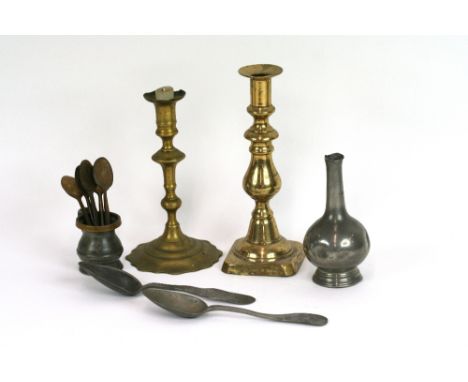 An 18th Century pewter spoon, with rustic handle and pear shaped bowl; various 19th Century pewter "Old English" pattern and 