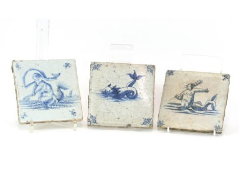 Three early English Delftware tiles, depicting mythical beast figures