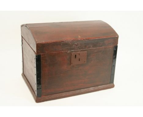 A Victorian stained pine dome top trunk, metal bound with square iron lockplate, 48cm wide