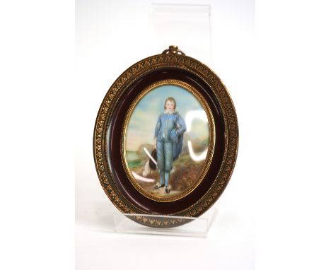 A miniature portrait study depicting a young boy wearing blue suit and plumed hat in brass and simulated mahogany frame