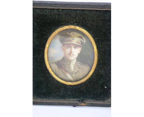 A WW1 period miniature portrait study of an army officer, contained in a leather folding case