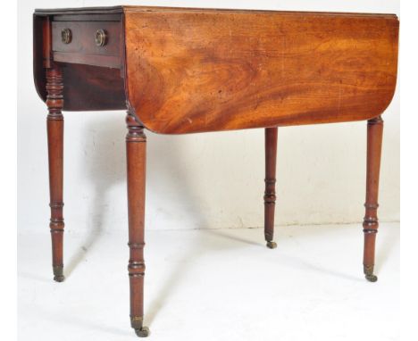 A vintage 19th Century mahogany Pembroke table. Of rectangular form flanked by two drop leaves with single drawer to end with