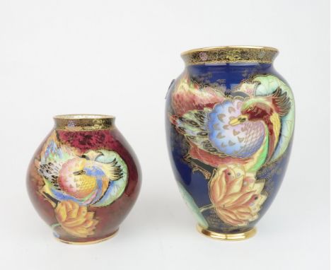 TWO CARLTON WARE CRESTED BIRD AND WATERLILY PATTERN VASES  one on a blue ground, pattern no. 3529, 18cm high, the other on ro