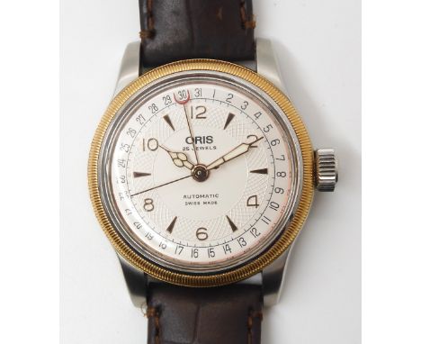 AN ORIS AUTOMATIC WRISTWATCH with two tone cream textured dial with gold coloured chevron and Arabic numerals and main hands.