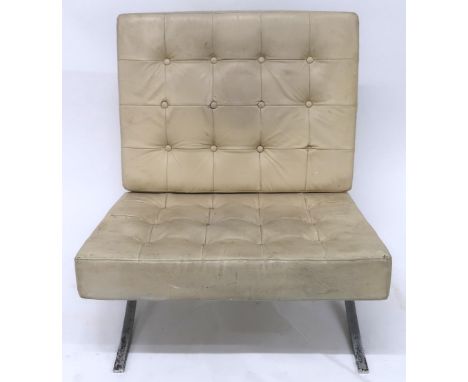 A 20TH CENTURY AFTER&nbsp;LUDWIG MIES VAN DER ROHE "BARCELONA" CHAIR with cream vinyl button back upholstered cushions on bru