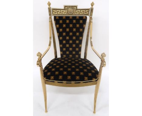 A 20TH CENTURY GILT FRAMED VERSACE STYLE BOUDOIR CHAIR with lion masque patterned upholstered seat and back capped by Medusa 