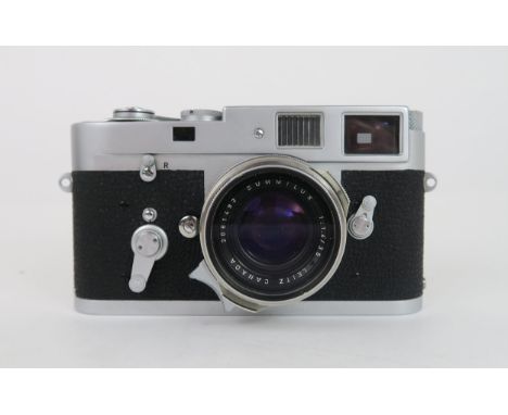 A 1964 LEITZ LEICA M2 RANGEFINDER CAMERA FITTED WITH A LEITZ SUMMILUX 1:1.4/35 LENS Serial no. 1098612, lens serial no. 20614