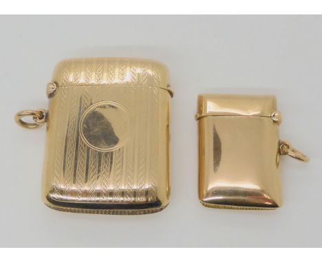 TWO 9CT GOLD VESTAS the first with all over linear engine turned engraving, hallmarked London 1924, made by Deakin & Francis 
