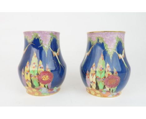 A PAIR OF ART DECO CARLTON WARE VASES in Fantasia pattern, on dark blue ground, pattern no. 3406, 15.5cm high Condition Repor