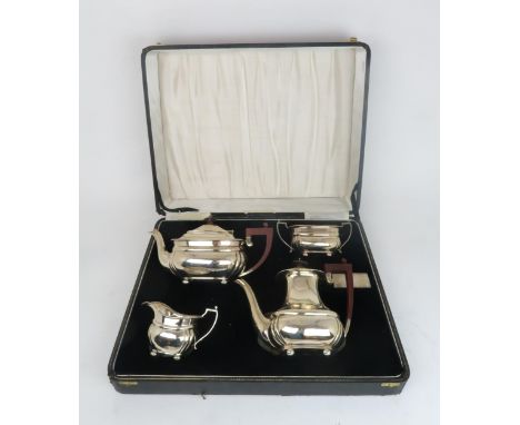 A CASED ELIZABETH II FOUR PIECE SILVER TEA SERVICE by Adie Brothers Ltd, Birmingham, the tea and coffee pot 1959, the sugar b