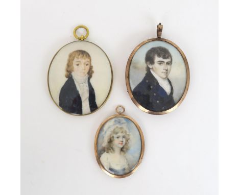 A GROUP OF THREE EARLY 19TH CENTURY PORTRAIT MINATURES&nbsp; Painted on ivory, depicting respectively a dark-haired gentleman