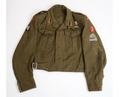 A WW2 POLISH 2ND CORPS BATTLEDRESS BLOUSE In khaki wool serge, with epaulettes bearing rank of Starszy Szergowy&nbsp;(Lance C