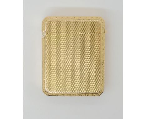 A 9CT GOLD VESTA with all over engine turned engraving with hand engraved borders, hallmarked Birmingham 1927, retailed by Go