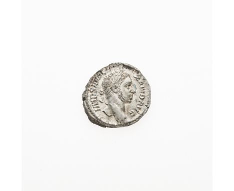 OBVERSE: Laureate head (right); REVERSE: Mars standing (right), holding spear and resting left hand on shield; RIC 83. Sharpl