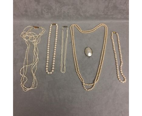 Quantity of pearls to include freshwater, cultured, synthetic,  and Mother of Pearl style brooch 