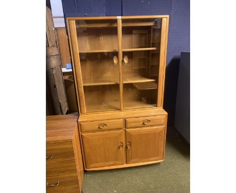 Ercol glazed cabinet, with cupboard and drawers below, 160 high x 43cm depth x 91xm wide.&nbsp; Scratches to one side please 