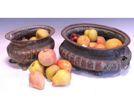 An 18th century copper bowl with gadrooned relief, containing simulated fruit, the larger planter 16 x 38 x 30cmProvenance:Co