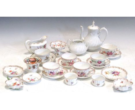 A collection of Dresden and other floral decorated porcelain, including teacups, sugar bowl, milk jug, etcFading to the gilt 