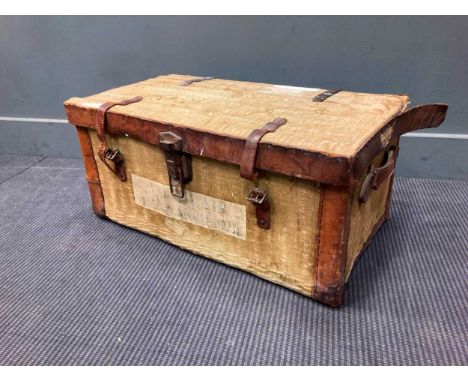 A canvas and leather trunk, 32 x 72 x 41cm