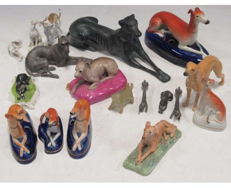 A collection of greyhound figures to include Staffordshire inkwells, a standing model by Beswick England and various others, 