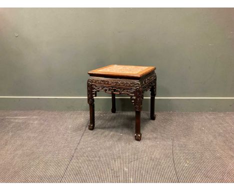 An early 20th century Chinese hard wood and marble top low table, 48 x 43 x 43cmCondition is goodGeneral knocks and light scr