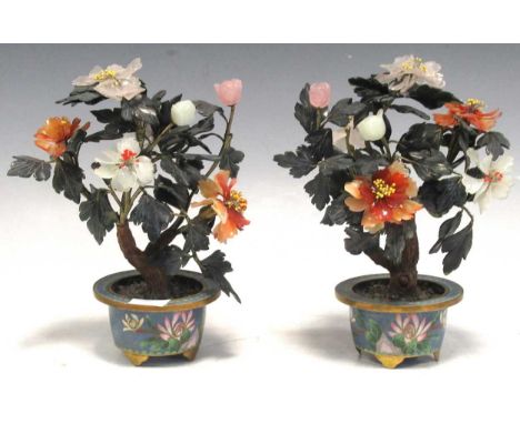 A pair of Oriental miniature decorative cloisonne planters with probably nephrite jade leaves (untested), approx 20cm high