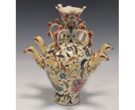 A Zsolnay vase multiple bird head mounts, losses to castellated rim, 33cm high