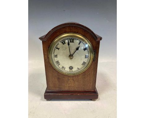 An Edwardian dome top mantel timepiece, 20cm high, and an American wall clock, 66 x 39 x 10.5cm
