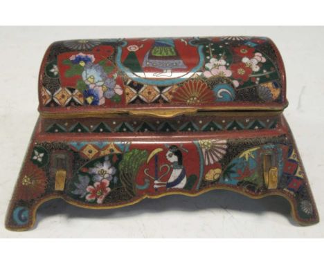 A Japanese cloisonne enamell inkwell, with pen rest to the front, hinged cover with two inkwells, 12.5cm wideMarkings to the 