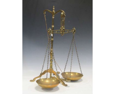 A set of brass scales stamped Doyle and son, London, 57cm high