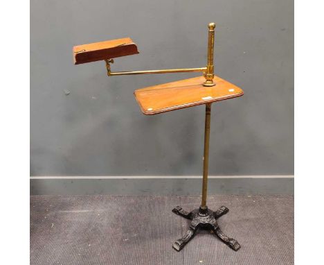 A Victorian mahogany and wrought iron reading table, with gilt adjustable lectern, 104cm highProvenance:Collection of the lat