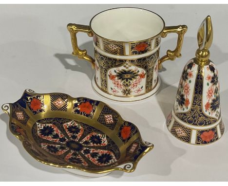 A Royal Crown Derby Imari palette 1128 pattern candle snuffer, first quality; an 1128 loving cup, first quality; an 1128 shap