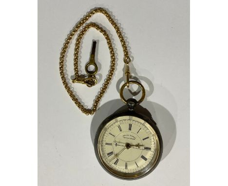 An unusual interior gold plated open face chronometer, centre seconds, an unmarked gold chain, the clasps probably gold plate