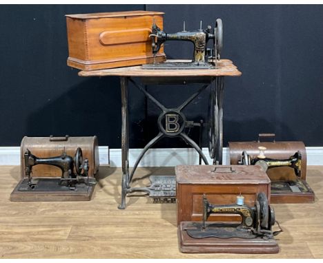 A Bradbury Rotary Shuttle treadle sewing machine; others, table-top, Singer (4) 