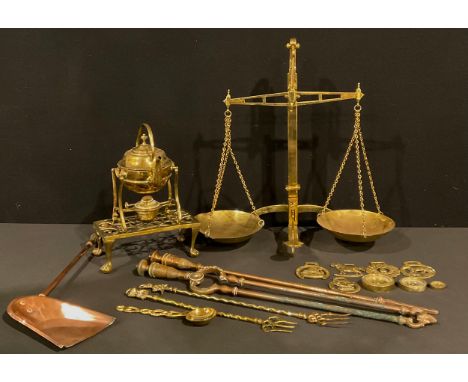A 19th century copper fireside companion set; a set of brass banker's beam scales, Mattwood, Birmingham, 57cm high; a brass s