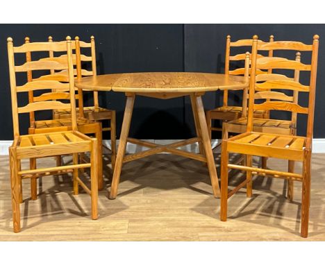An Ercol pine dropleaf dining table, 72cm high, 64.5cm opening to 124.5cm long, 113.5cm wide; a set of five conforming dining