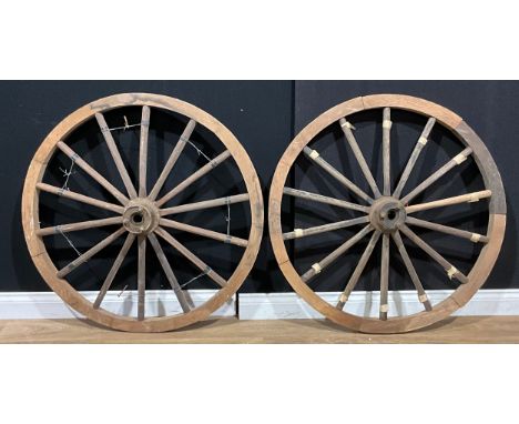 A pair of vintage cart wheels or wagon wheels, 100cm diameter 
