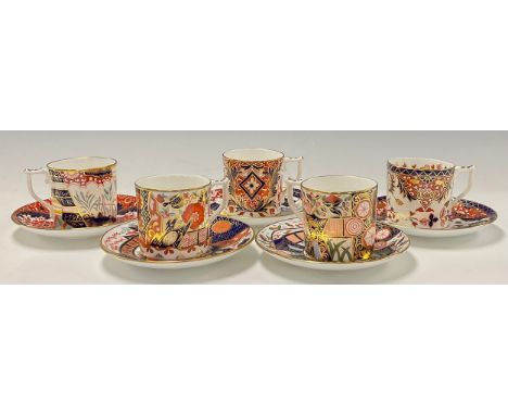 A set of four Royal Crown Derby Curator's Collection coffee cans and saucers and one harlequin set, comprising Tree of Life, 